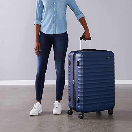 Maleta de Viaje Rígida Amazon Basics Giratoria 78 cm – Grande, Color Azul Marino