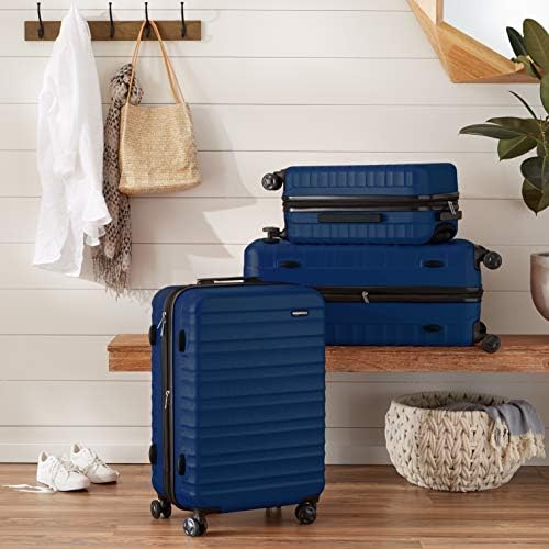 Maleta de Viaje Rígida Amazon Basics Giratoria 78 cm – Grande, Color Azul Marino