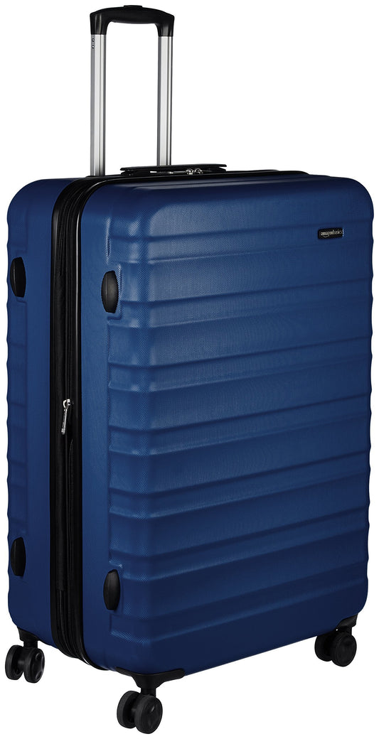 Maleta de Viaje Rígida Amazon Basics Giratoria 78 cm – Grande, Color Azul Marino